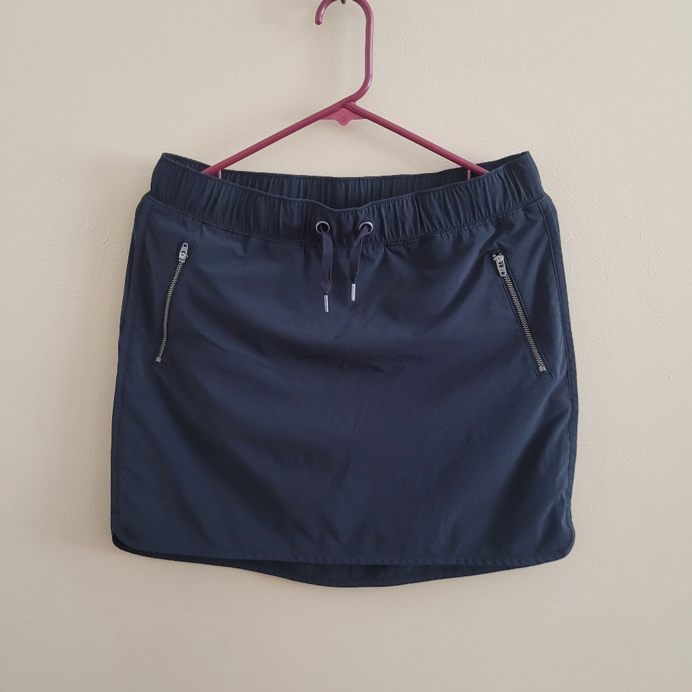 Athleta | Black Skirt with Shorts Skort Zipper Pockets Medium